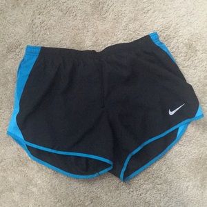 Black and light blue Nike Dri Fit shorts
